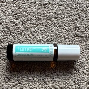 doTERRA Tamer Essential Oil Roll-On in Turquoise and White